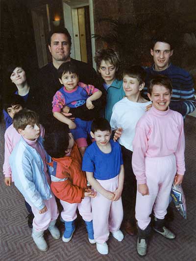 John Upton with several orphans he rescued